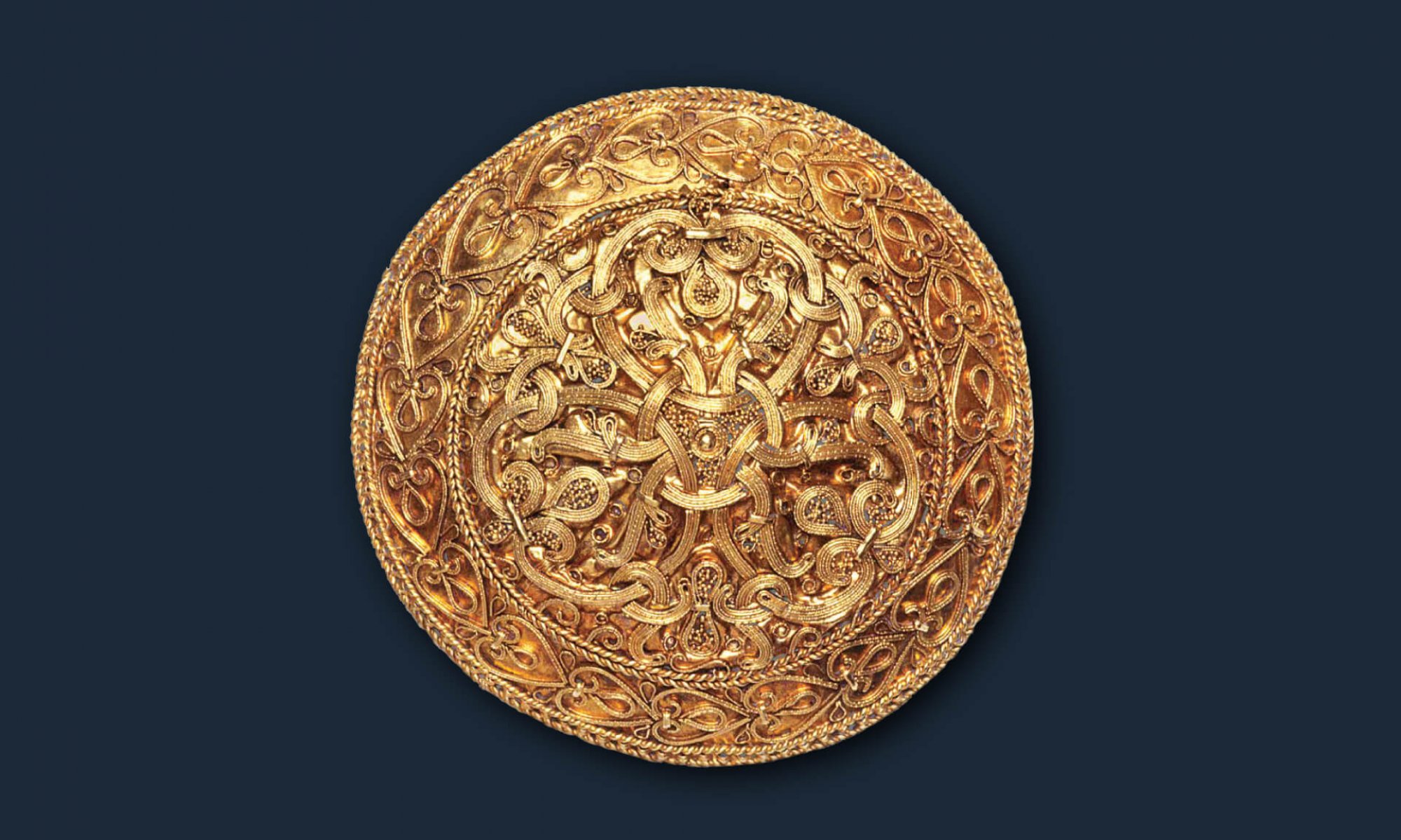 Civilizacija, zlata vikinška broška